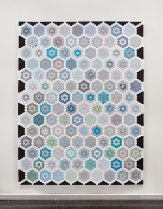 Illustration for article titled You'd Never Guess These Quilts Are Made From 1000s of Envelopes